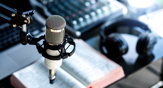 Christian podcast studio interior. preacher reads the bible online, records a podcast, online radio broadcast